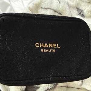 CHANEL Black Cosmetic Pouch with Gold Logo
